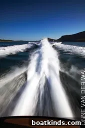 Boat Wake Safety: How to Monitor and Reduce Wake Damage 2 Boat creating a wake on open water