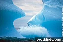 Morgan's Cloud in icy waters with dramatic scenery