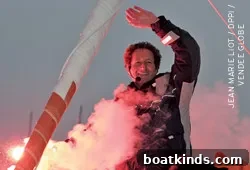 Michel Desjoyeaux crossing the finish of the Vendée Globe