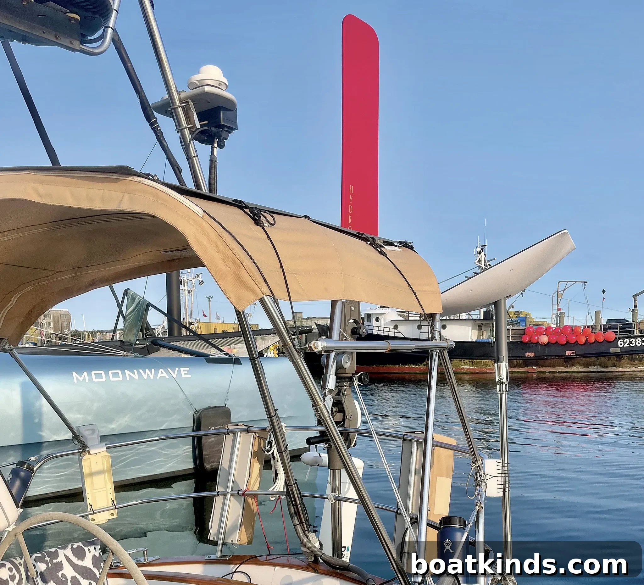 Couple sailing and working aboard their boat