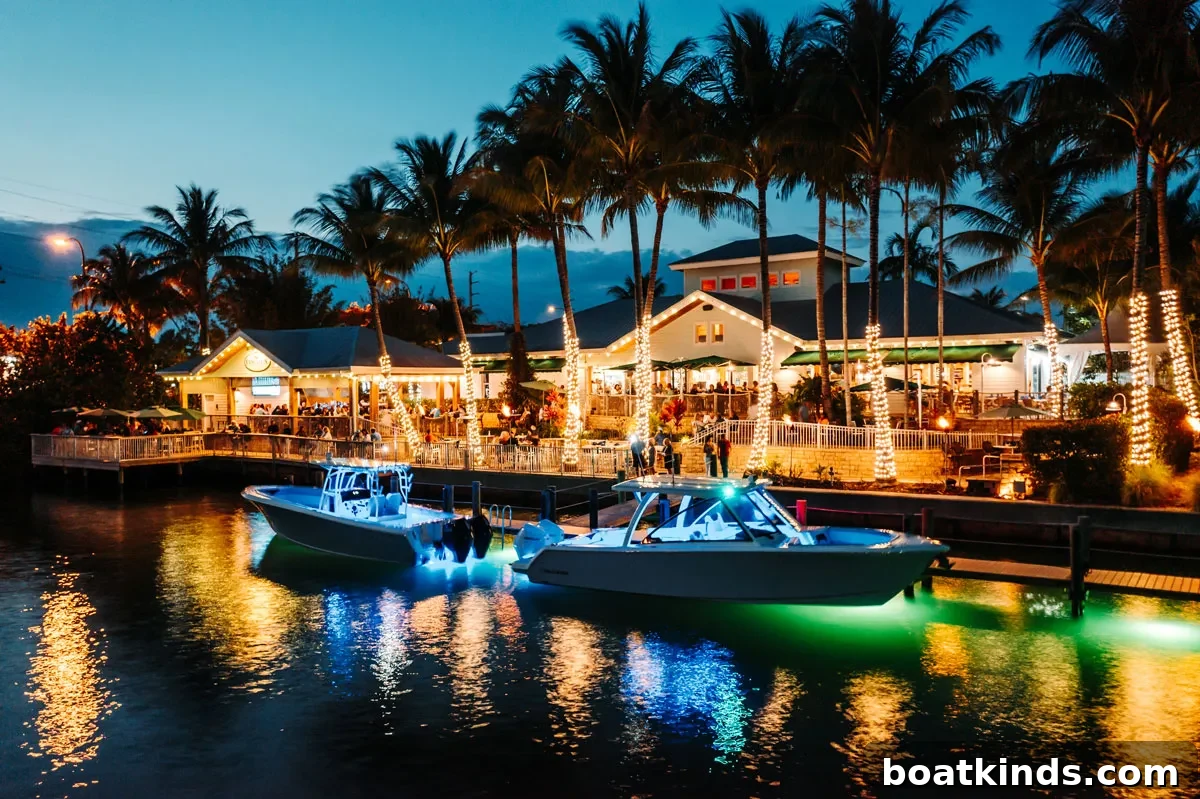 Docked boat next to waterfront dining