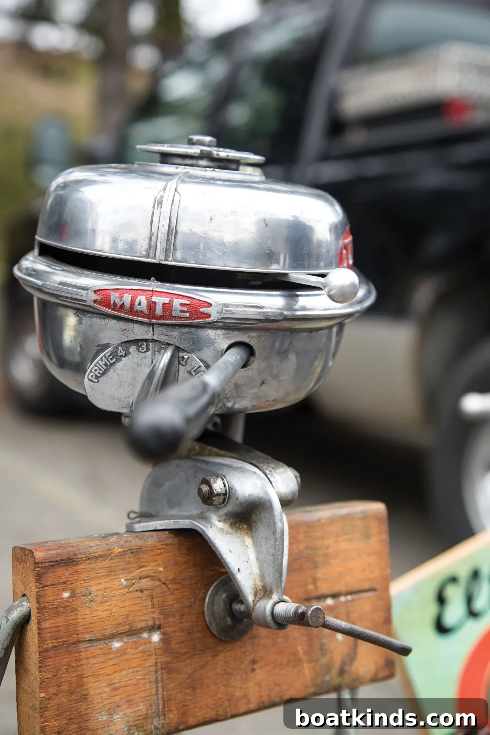 Collectors and restored outboards at a show