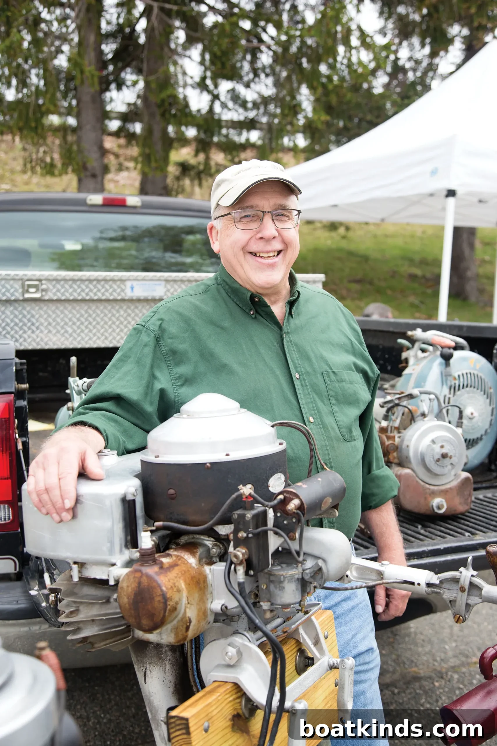 Antique outboards arrayed for inspection
