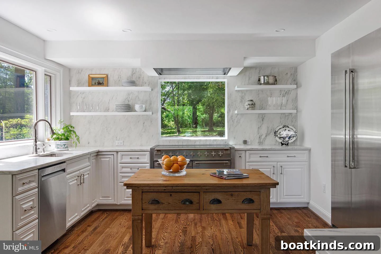 Renovated kitchen with marble countertops